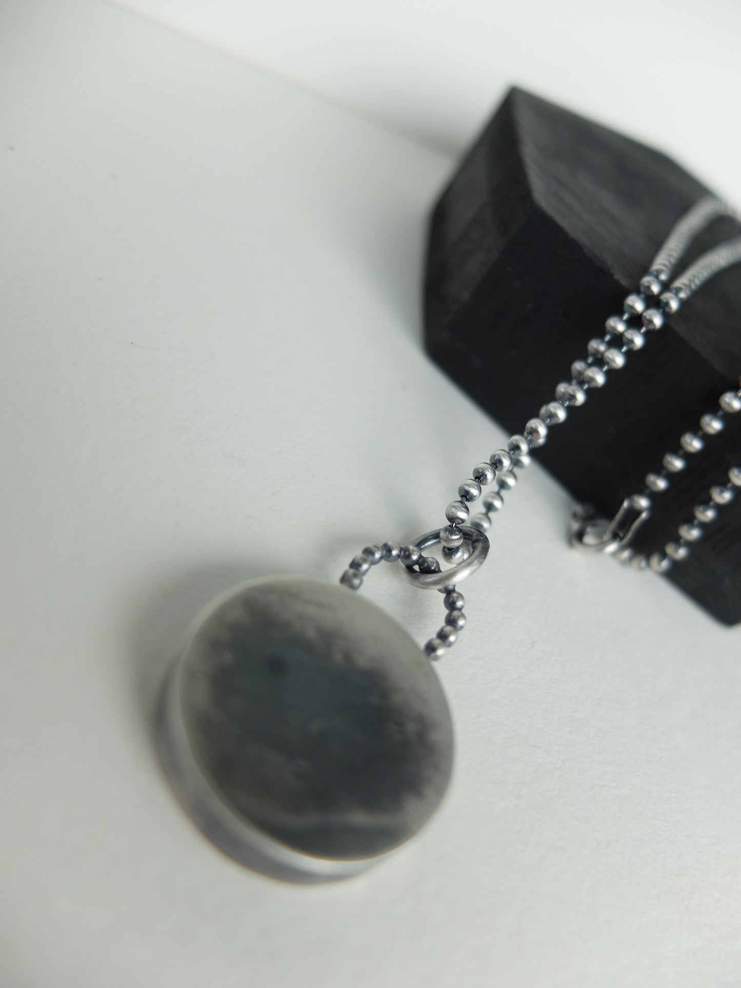 Necklace with a pendant on a white background