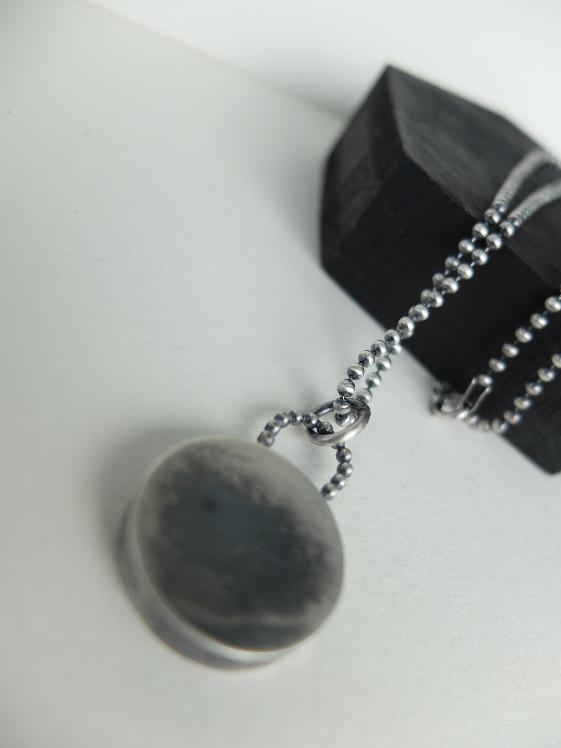 Necklace with a pendant on a white background
