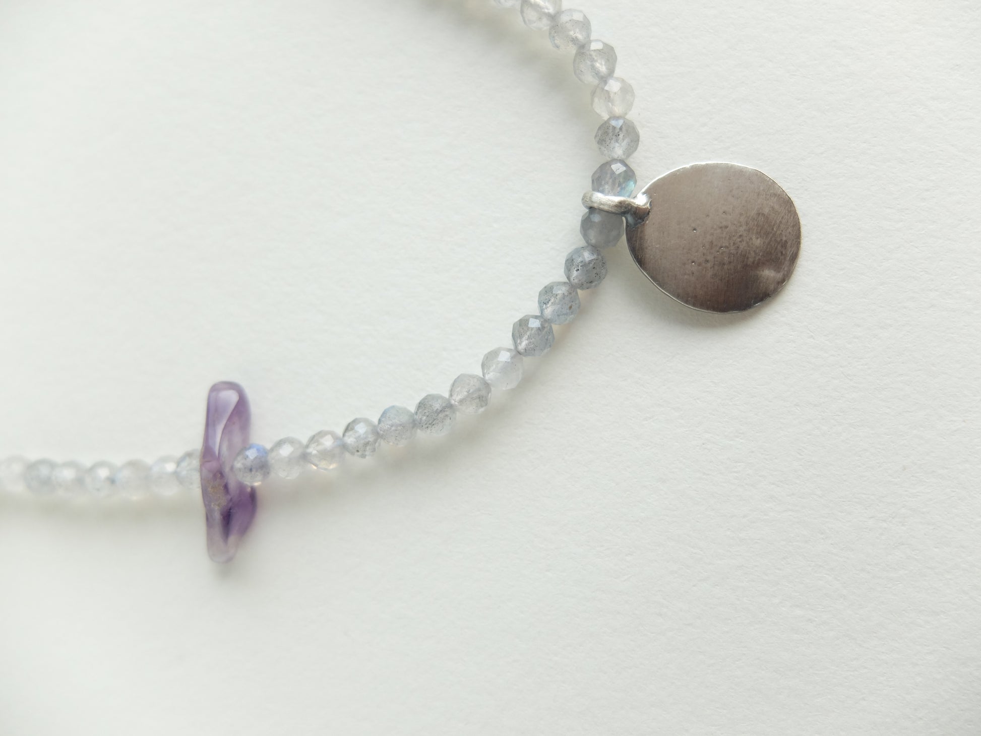 Necklace with beads on a white background