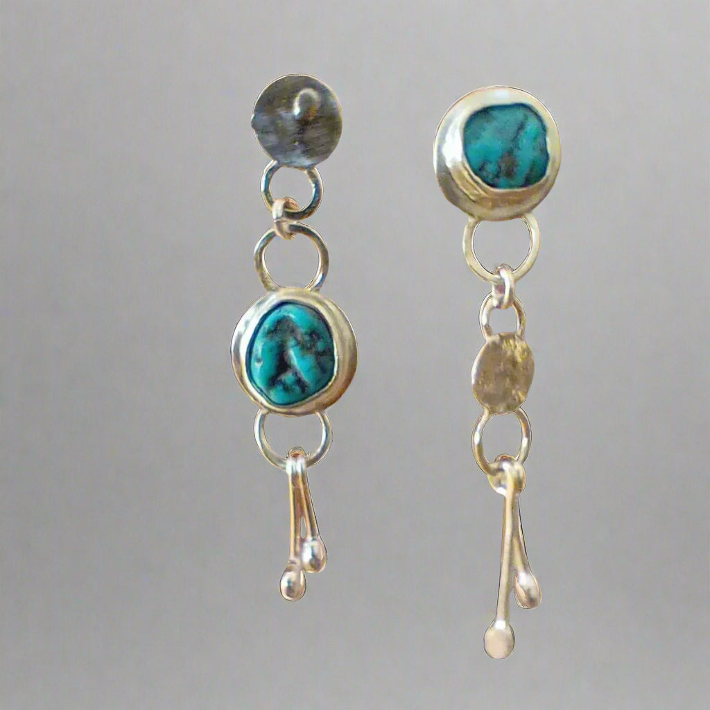 Delia asymmetric and mismatched silver earrings