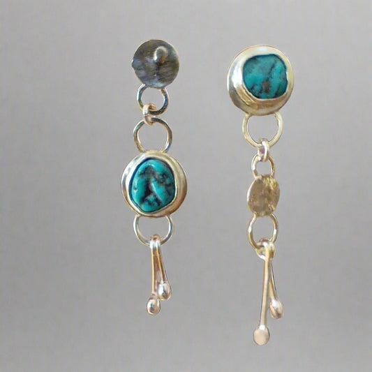 Delia asymmetric and mismatched silver earrings