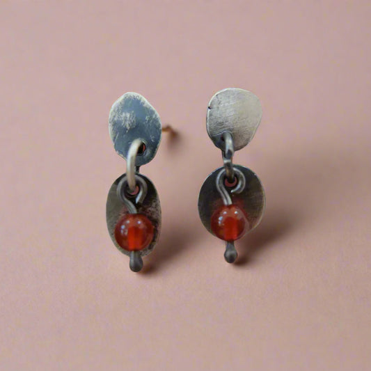 Pair of silver earrings with red carnelian bead